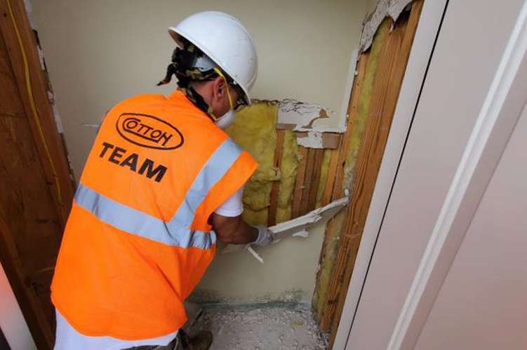 OG体育 clearing wall damage in Lake Charles, LA