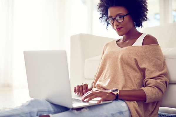 shot-of-a-young-woman-using-a-laptop-at-home-2023-11-27-04-50-22-utc.jpg
