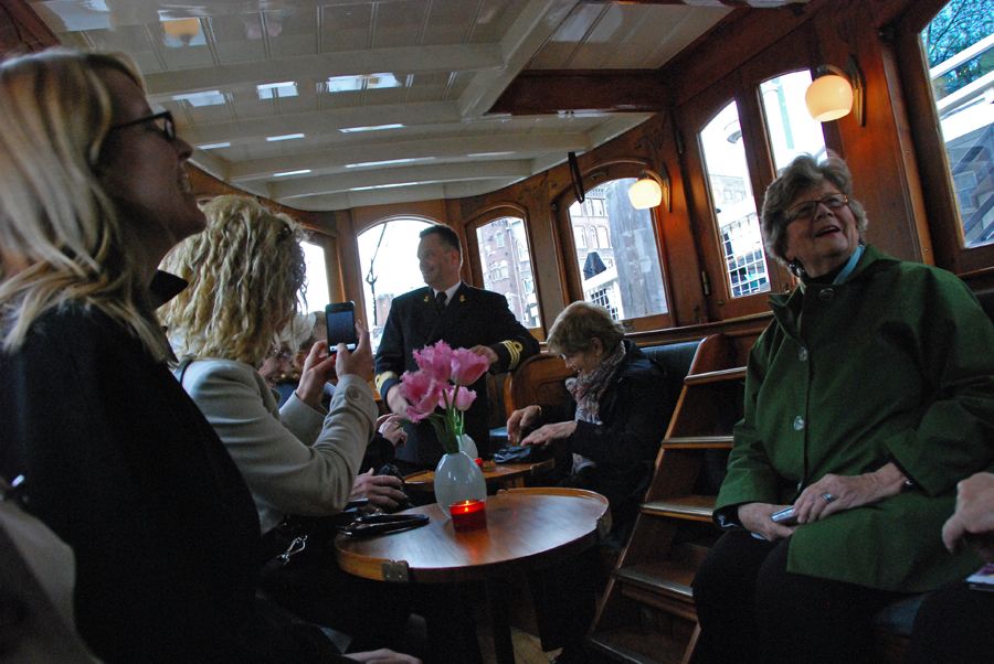 Cruising the canals in Amsterdam in our private boat with Captain Walter.jpg