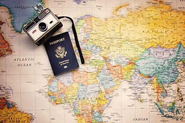 Passport, camera and map