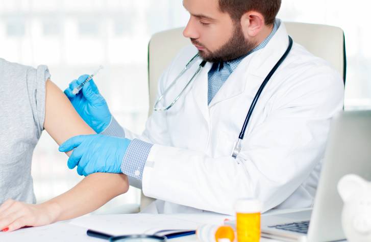 Patient receiving a vaccine Immunizations