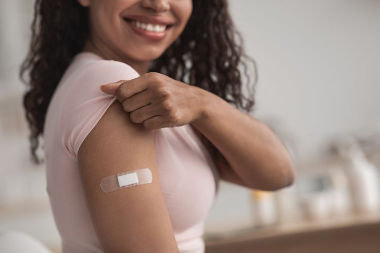 Immunization bandage on arm