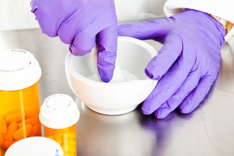 A person compounds medication Compounding