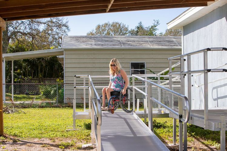 Person using a wheelchair ramp Durable Medical Equipment