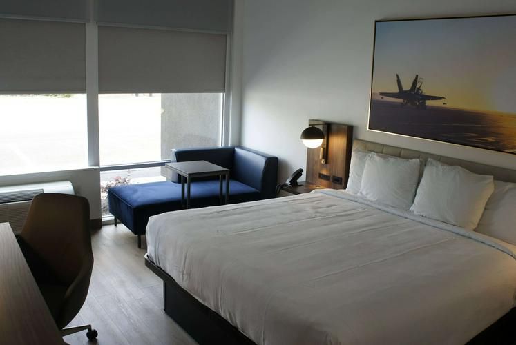 La Quinta Inn Suites Manchester king bed.jpeg