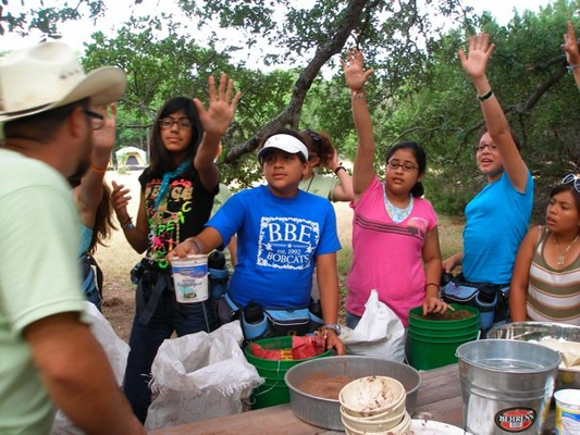 Campers making seed balls Conservation Day at El Ranchito, near Austin