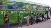 Students from AISD created the art incorporated in the bus wrap, donated by 3M. Artists of the Roadrunner