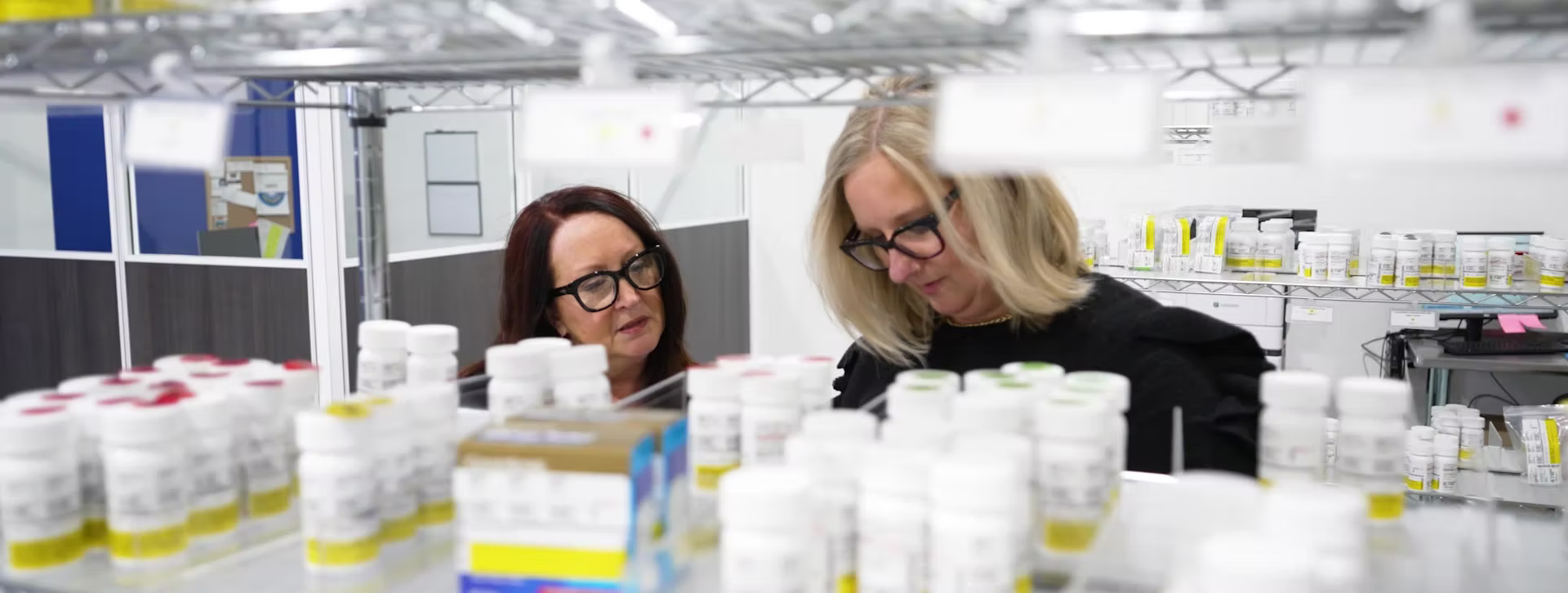 ASM Home Delivery pharmacists working to fulfill patient prescriptions. ASM Home Delivery Pharmacists