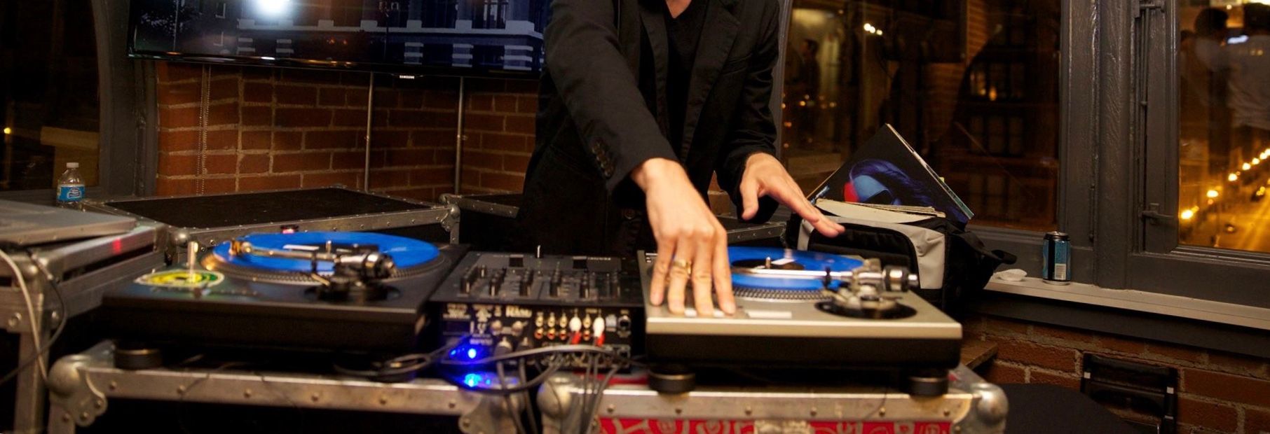 A DJ spinning at a party in St. Louis, Missouri