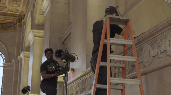 Stagecrew setting up lights
