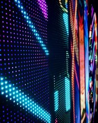 A close-up of an outdoor LED wall display