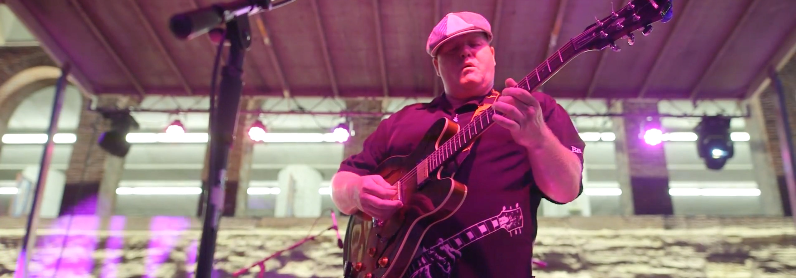 A man playing an electric guitar at Blues at the Arch in St. Louis