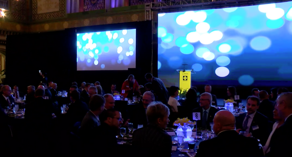 A two-screen projection display at a gala 