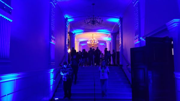 Blue lighting in a venue hallway