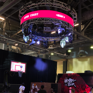 A circular truss marquee at And1's trade show booth at ComplexCon