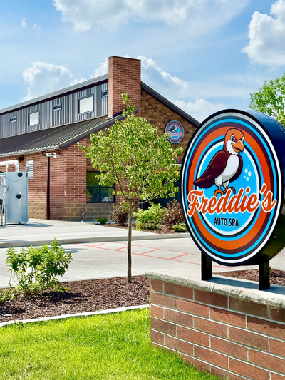 Freddie's Auto Spa Building and Sign.png