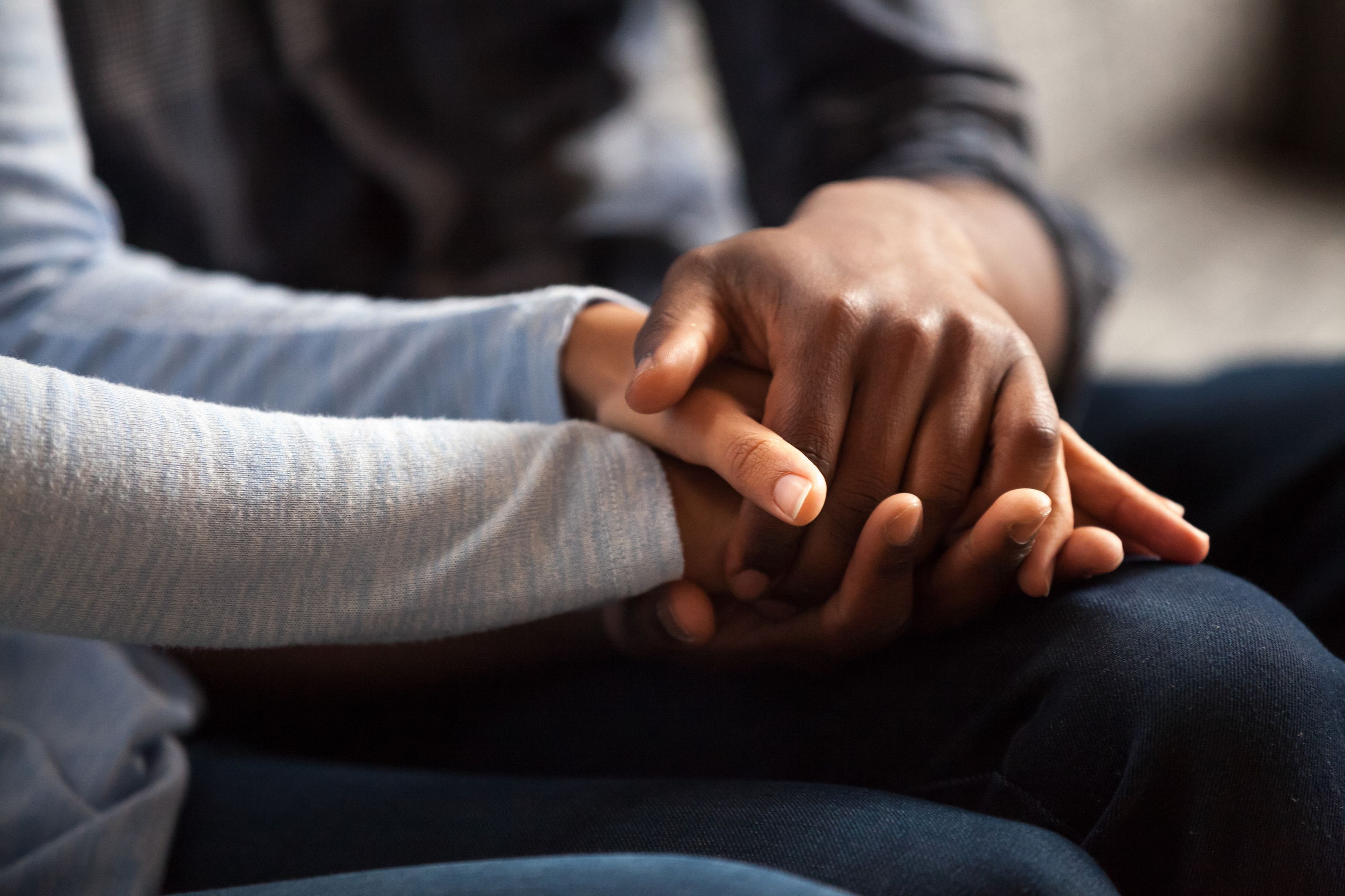 A couple holding hands Relationships & Family