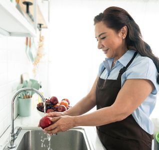 happy-smiling-asian-older-woman-apron-washing-apple-kitchen-housewife-cooking-concept.jpg
