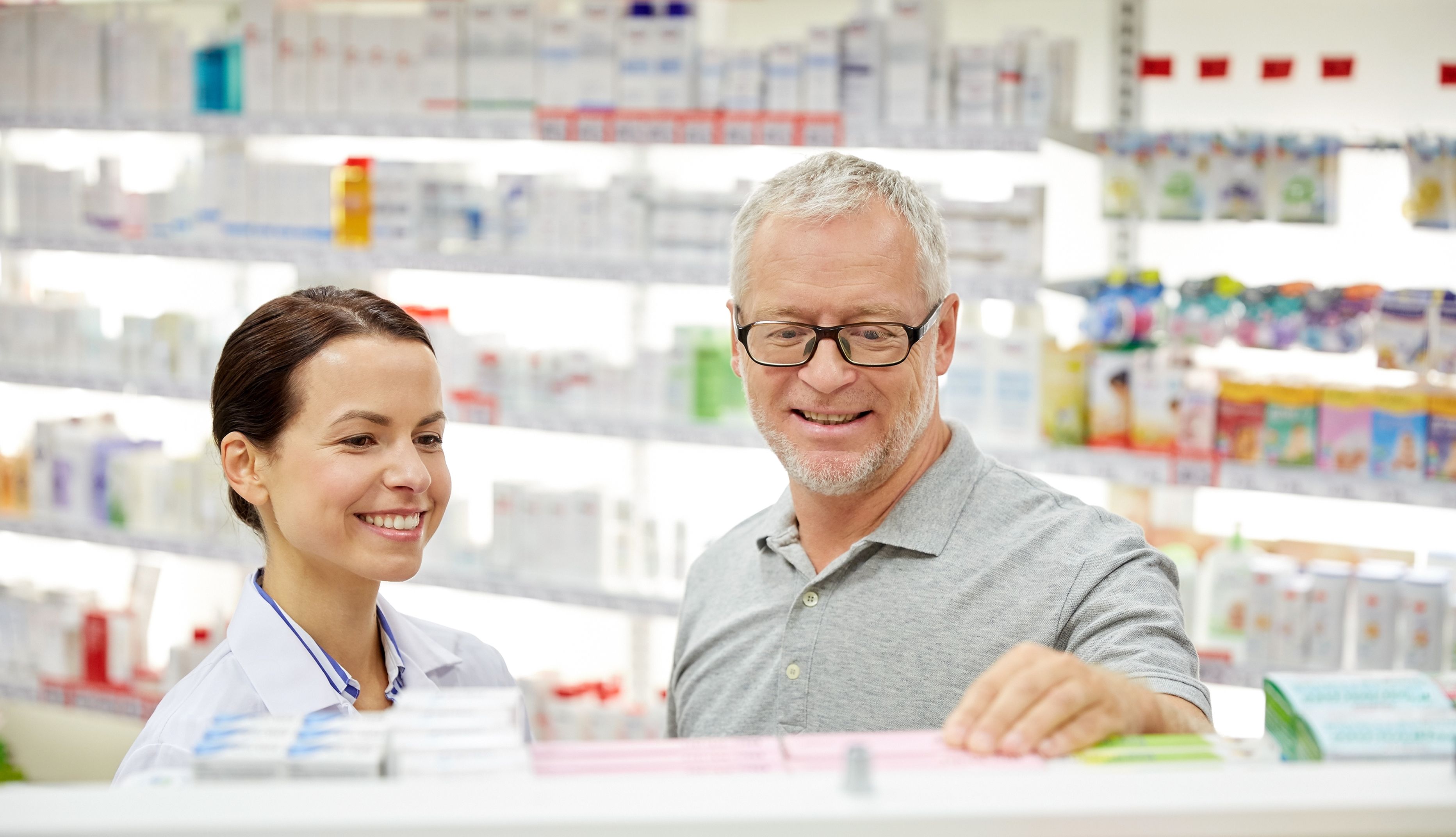 Pharmacist and Patient Smiling