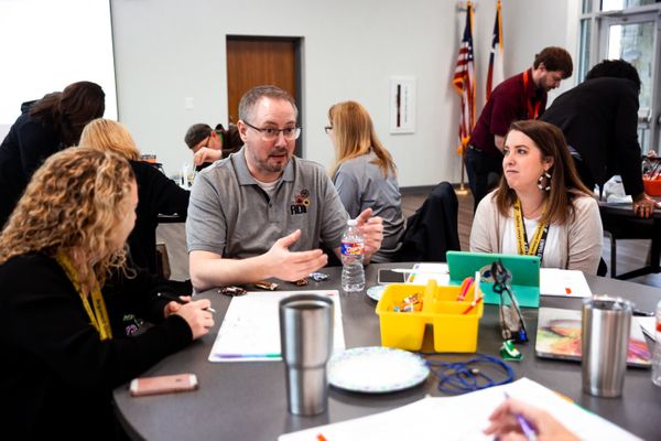 Vic Talking to a group of teachers