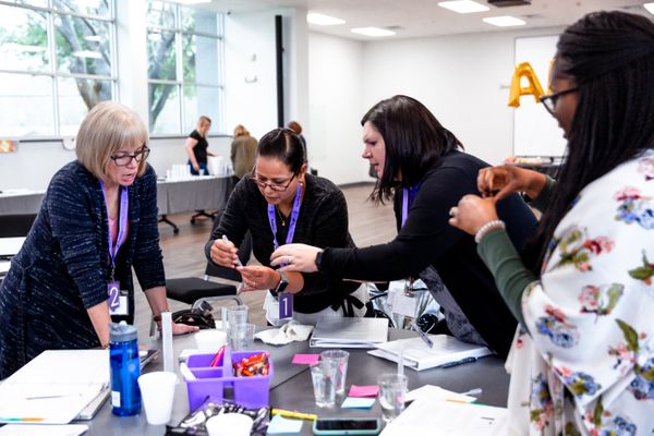 4 teachers working together.jpg