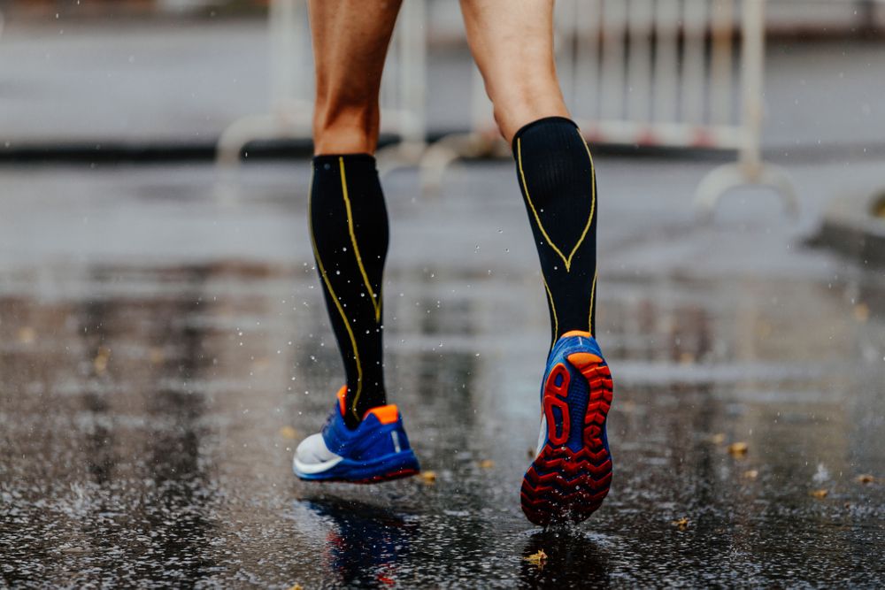 Image of runner wearing compression socks Acts Pharmacy and Healthcare Services