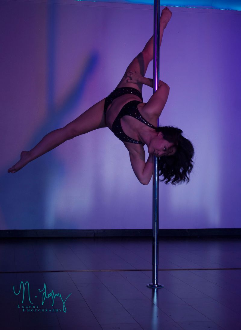 Men seeking workout challenge take pole-dancing class for a spin