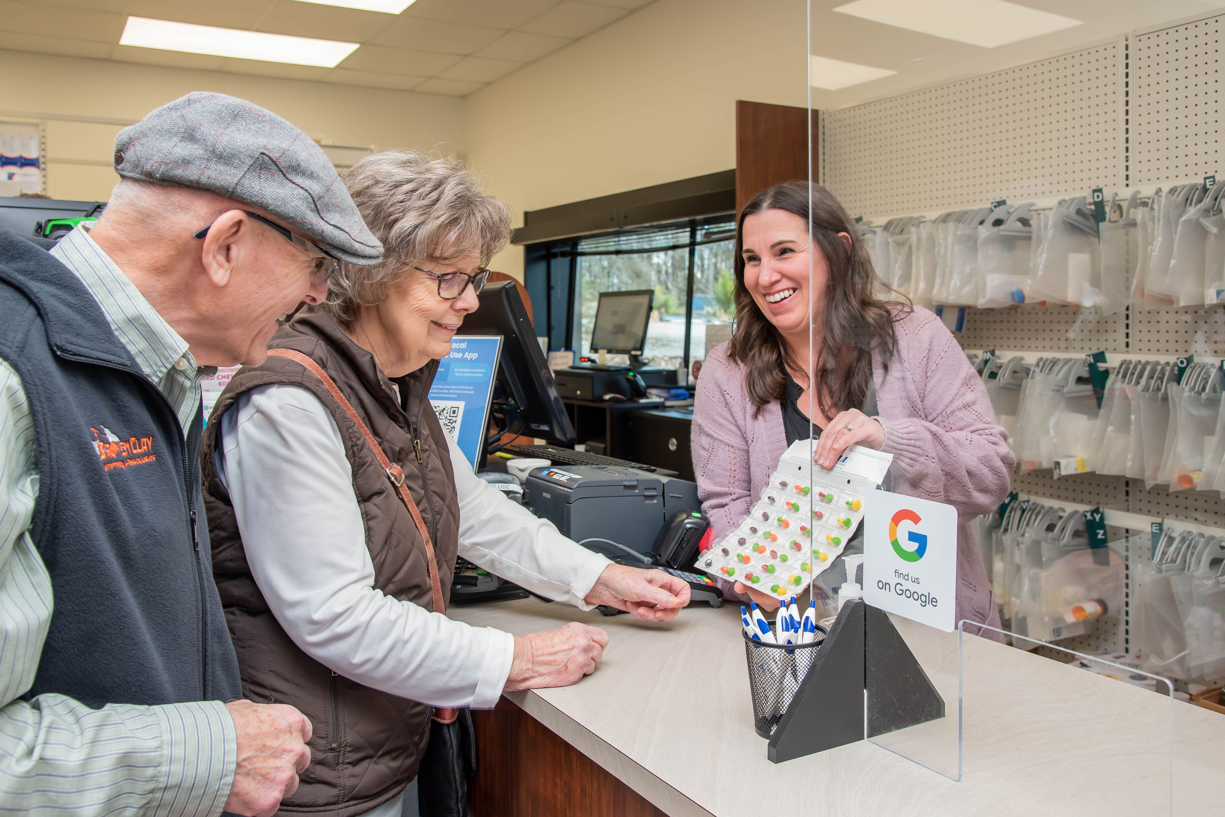 Image of a pharmacist show patients their medication Medication Adherence