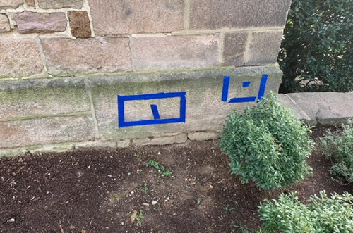 GPRS Area Manager Sam Hart inspects the cornerstone of Saint Paul’s Episcopal Church with a StructureScanTM Mini XT handheld GPR system