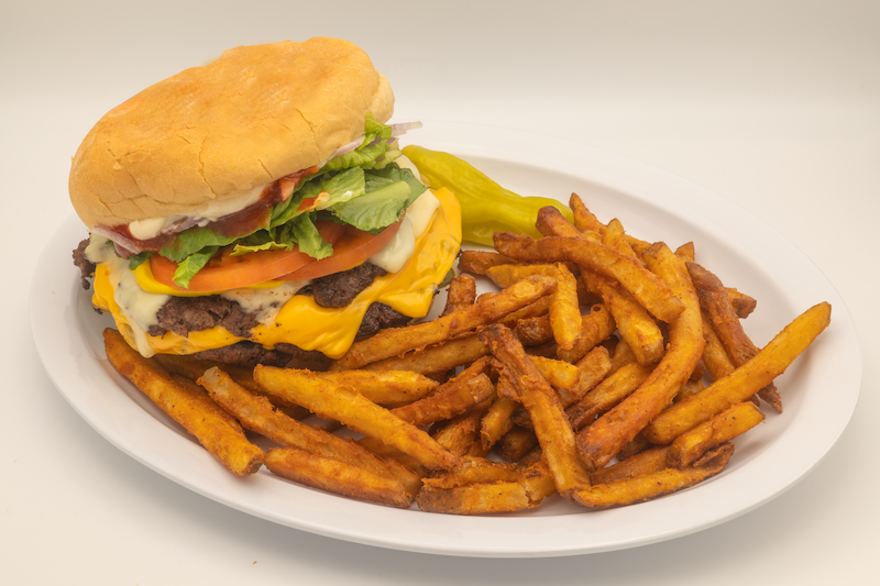 Over a half pound fresh beef pattie with mayonnaise, ketchup, cheese, onions, lettuce, tomatoes, pickles and mustard Route 25 Burger & Fries