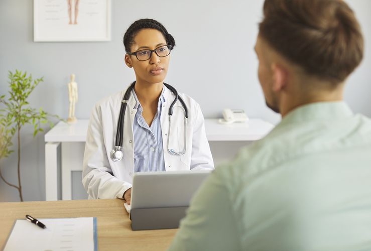 Man speaking with a doctor Men's Health