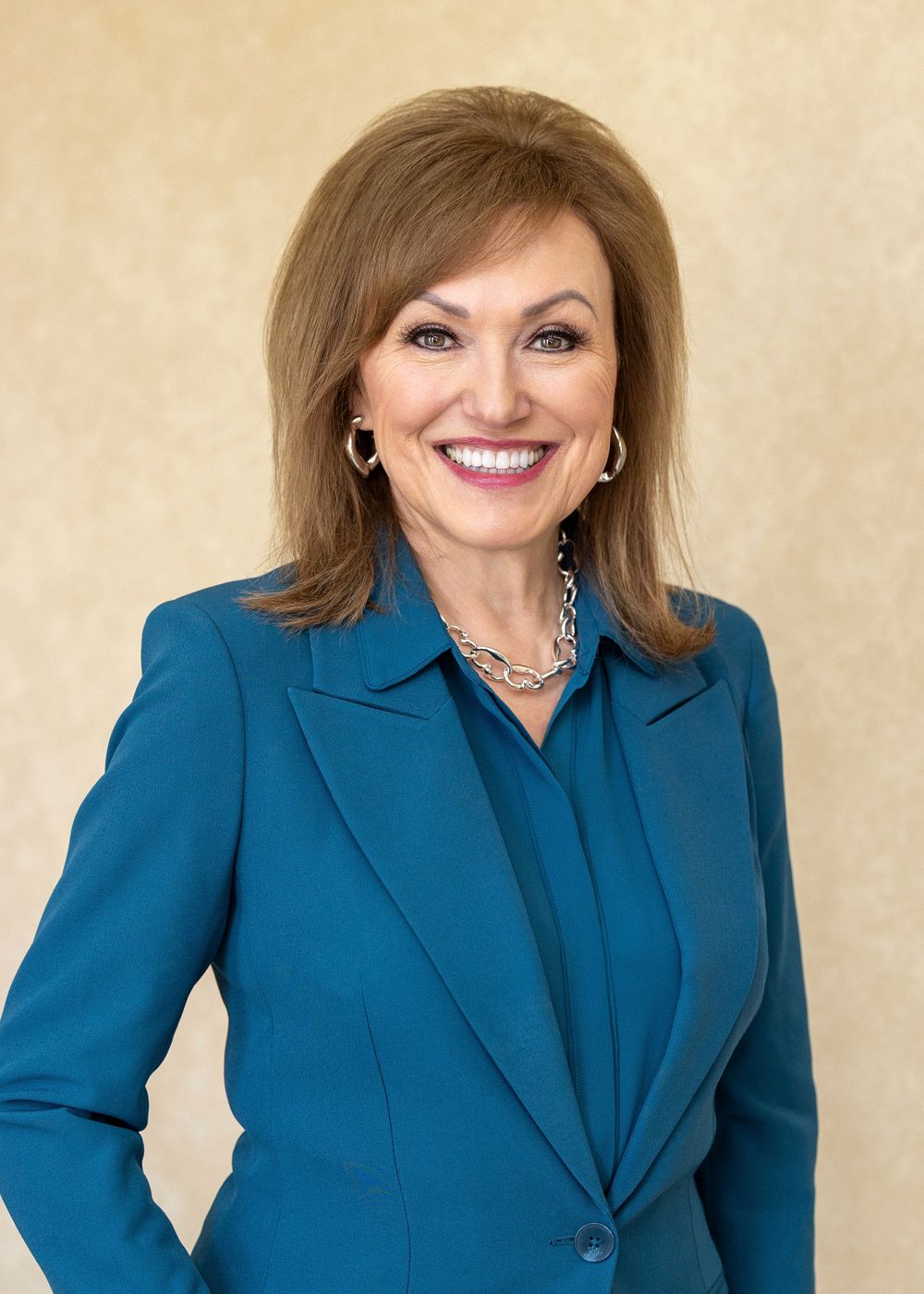 Dianne Boyer Headshot_Teal_1.jpg