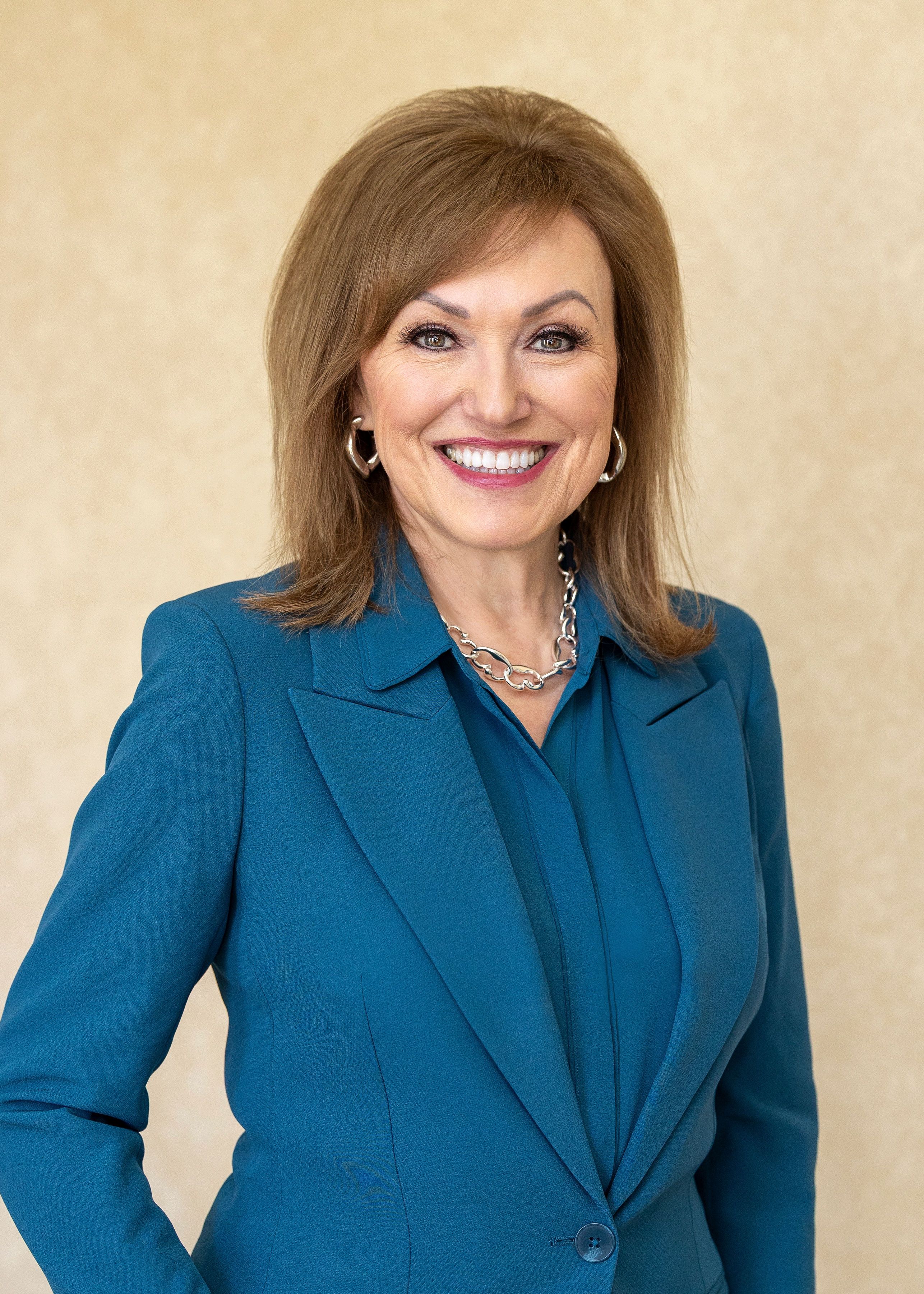 Dianne Boyer Headshot_Teal_1.jpg