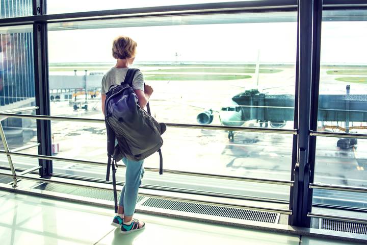 Women looking out of airport window