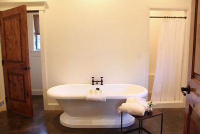 Main Photo Suites- Quad Bathroom with Tub.jpg