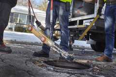 Wolverine® Crawler Lowered Into Sewer System