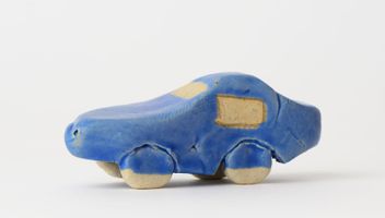 W. Tucker - a dark blue car