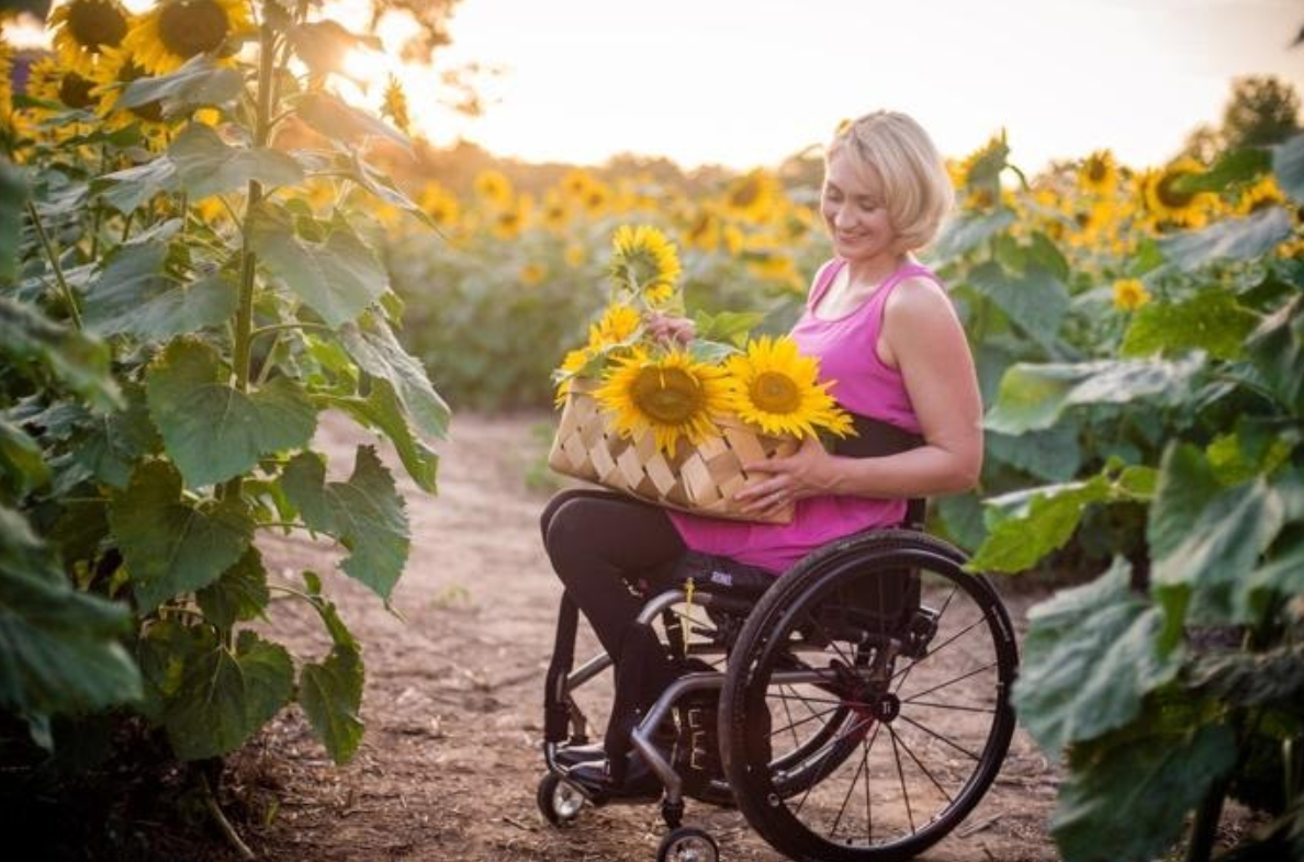 Woman in Wheelchair With Flowers