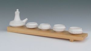 karen-hembree-ewer-and-bowls-on-sushi block-oxidation.jpg
