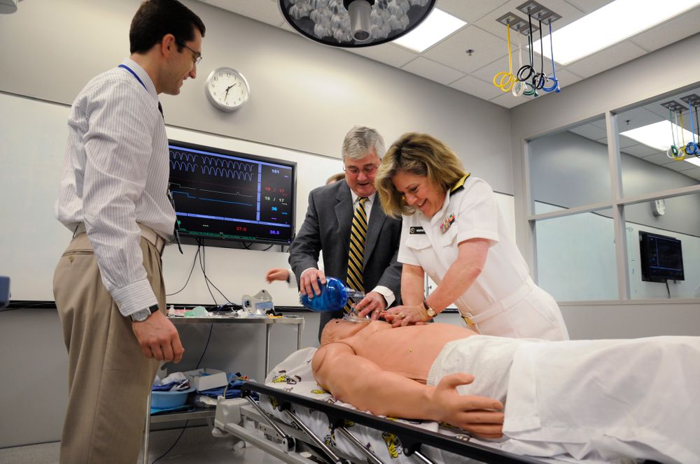 Flickr_-_Official_U.S._Navy_Imagery_-_ear_Adm._Elizabeth_Niemyer_performs_CPR_on_a_medical_dummy..jpg