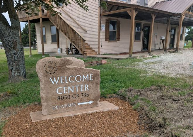 Large entrance boulder sign