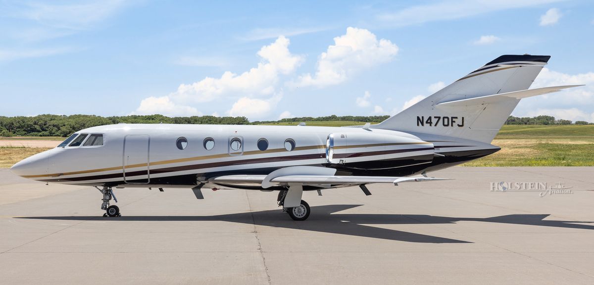 1986 Falcon 20F-5 - 470 - N470FJ - Ext - LS View RGB.jpg