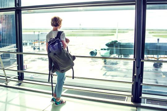 Women looking out of airport window