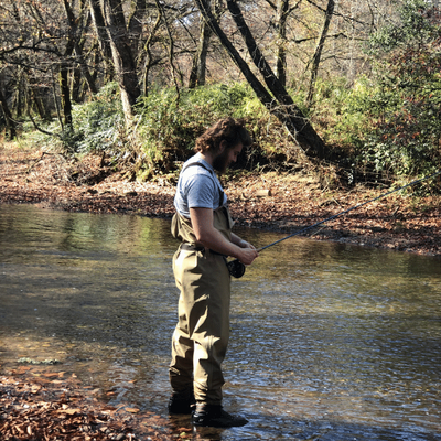 young adult fishing and getting the stimulation necessary for wellness ADHD in Young Adults