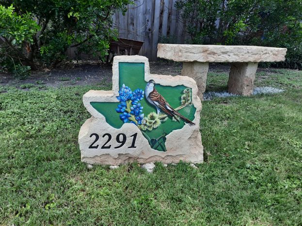 Carved Tx Stone and Bench.jpg