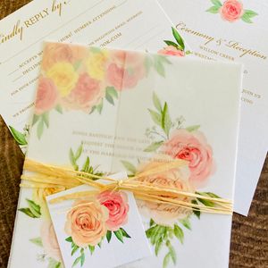 pastel colored florals with vellum and monogram