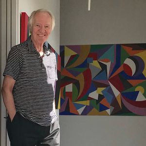 Racae Meyer - 26 Erwin smiling in hallway with Harmonious Quartet in background.jpg