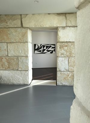 Racae Meyer - 5930 Bold Ruler Way - 22 Study - B&W 3 through stone doorway - longer view - good.jpg