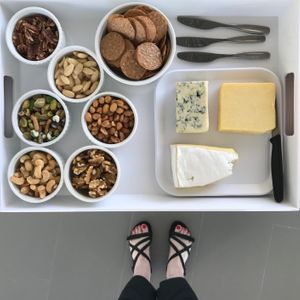 Racae Meyer - 76 Cheese and nuts tray from above with sandals.jpg