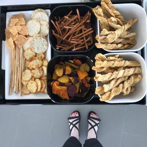 Racae Meyer - 78 Crackers and sticks tray from above with sandals.jpg